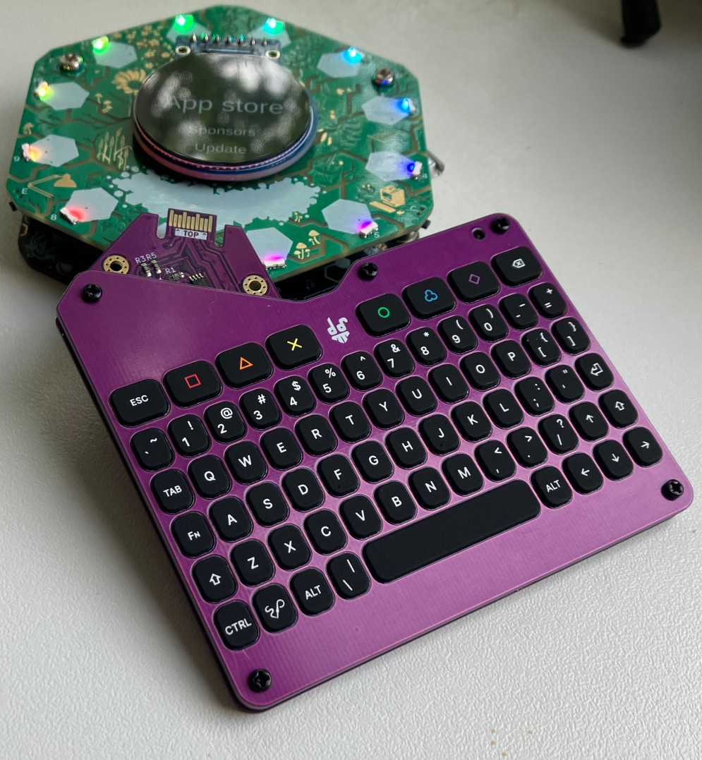 KeepDeck Hexpansion V3 next to the Tildagon