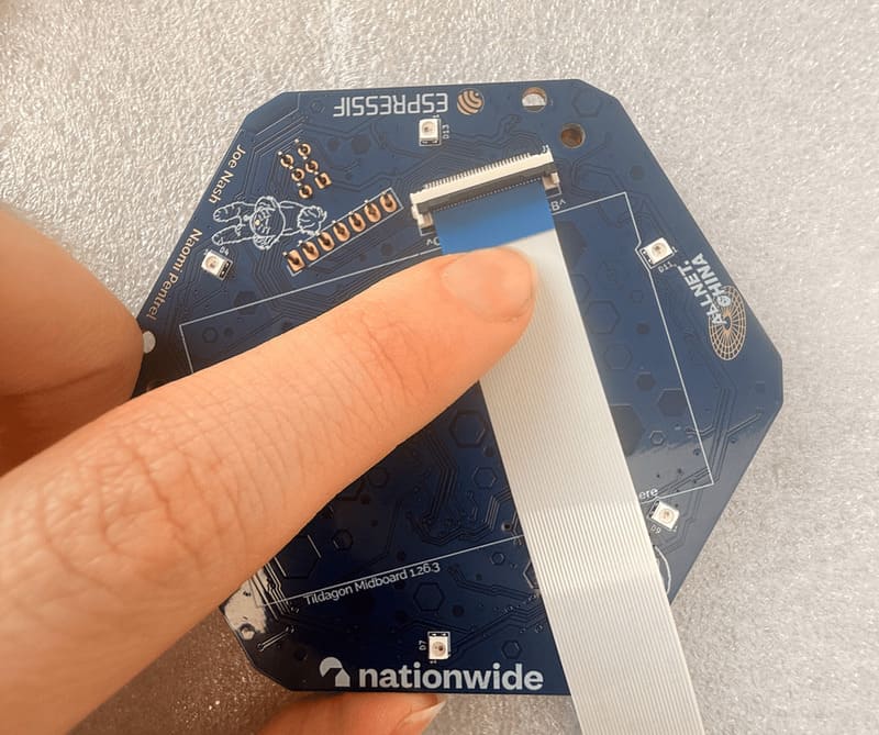 Attach the ribbon cable